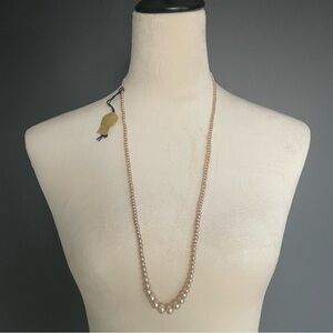 Vintage “indestructible” pink pearl necklace